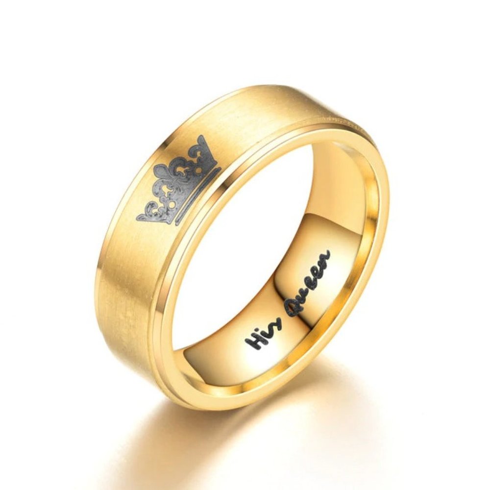 Gold wedding band. (His Queen).